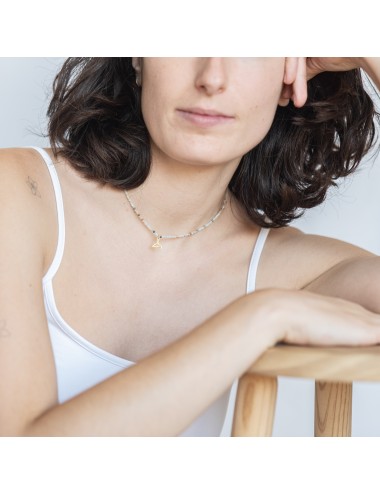 Collaret amb minerals i cua de balena daurada