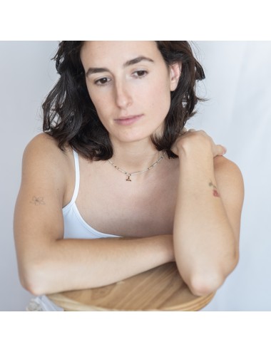 Collaret amb minerals i cua de balena daurada